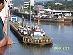 [Miraflores lock entrance; note the big arrow telling us to use the left-hand lock]