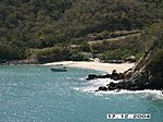 [The coastline near Huatulco is dotted with lovely coves and rocky beaches]