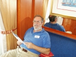 [Bob testing the stateroom couch]