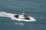 [Hawai`i Tug & Barge tugboat drops off our pilot, and will escort us into Kahului Harbor]