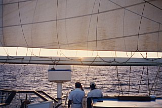 [Beautiful sunset seen through the sails]