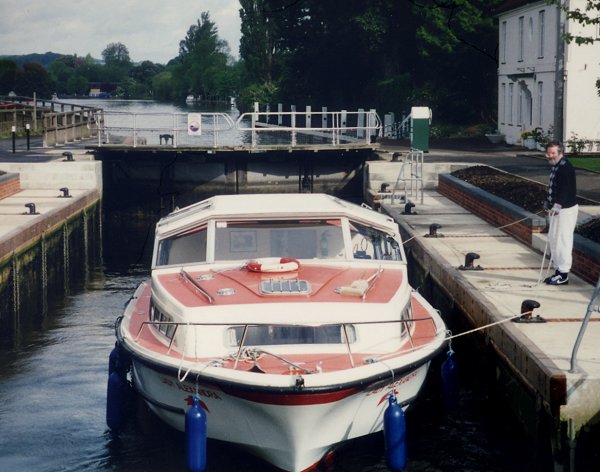 Boats in Thames Lock with, yes, towlines